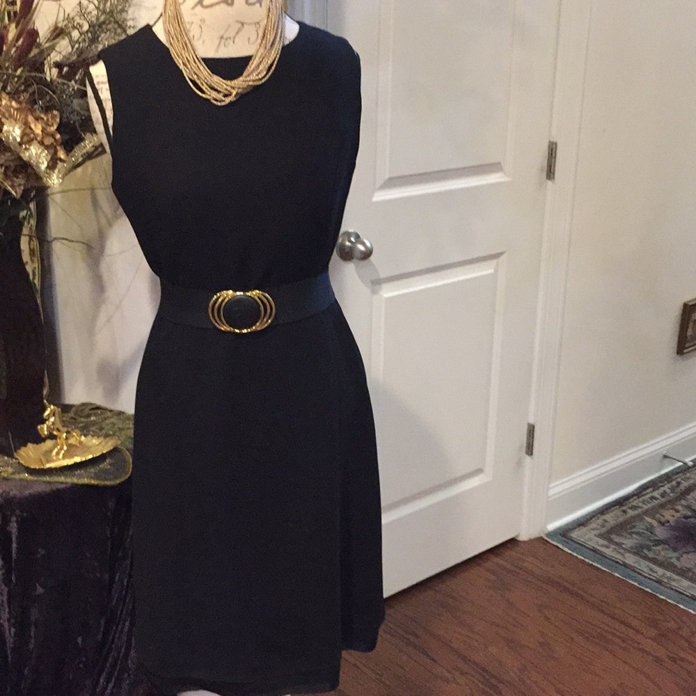 Black dress with necklace and belt
